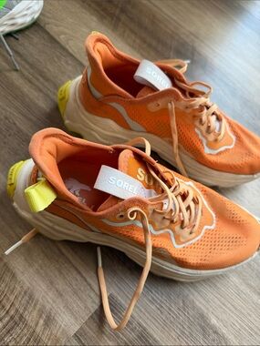 Sorel Orange Mesh Sneakers with Yellow Heel Tab
